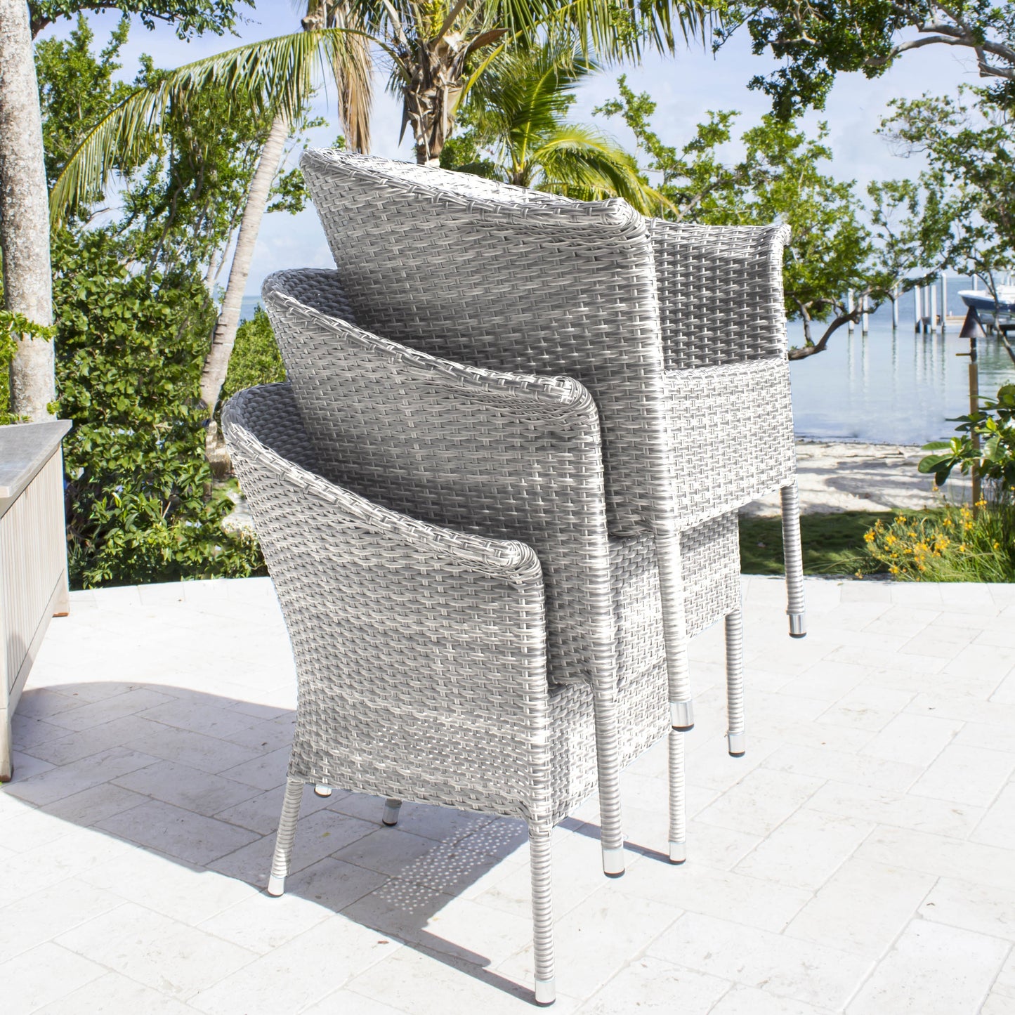 Hospitality Rattan Athens 7-Piece Woven Armchair Dining Set - wicker dining armchair with cushion close-up