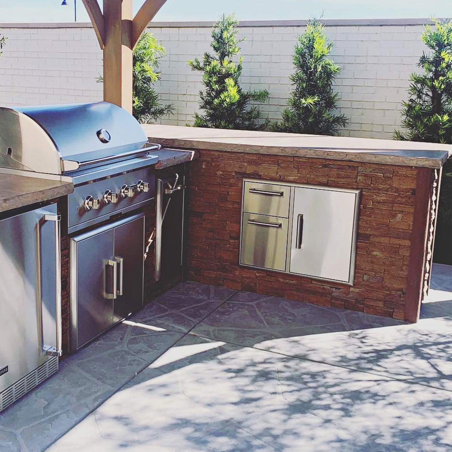 RTA Outdoor Living 8 foot L-Shaped Outdoor Kitchen Island with Coyote 30 Inch S-Series Grill, Fridge and Storage Bar - BetterPatio.com