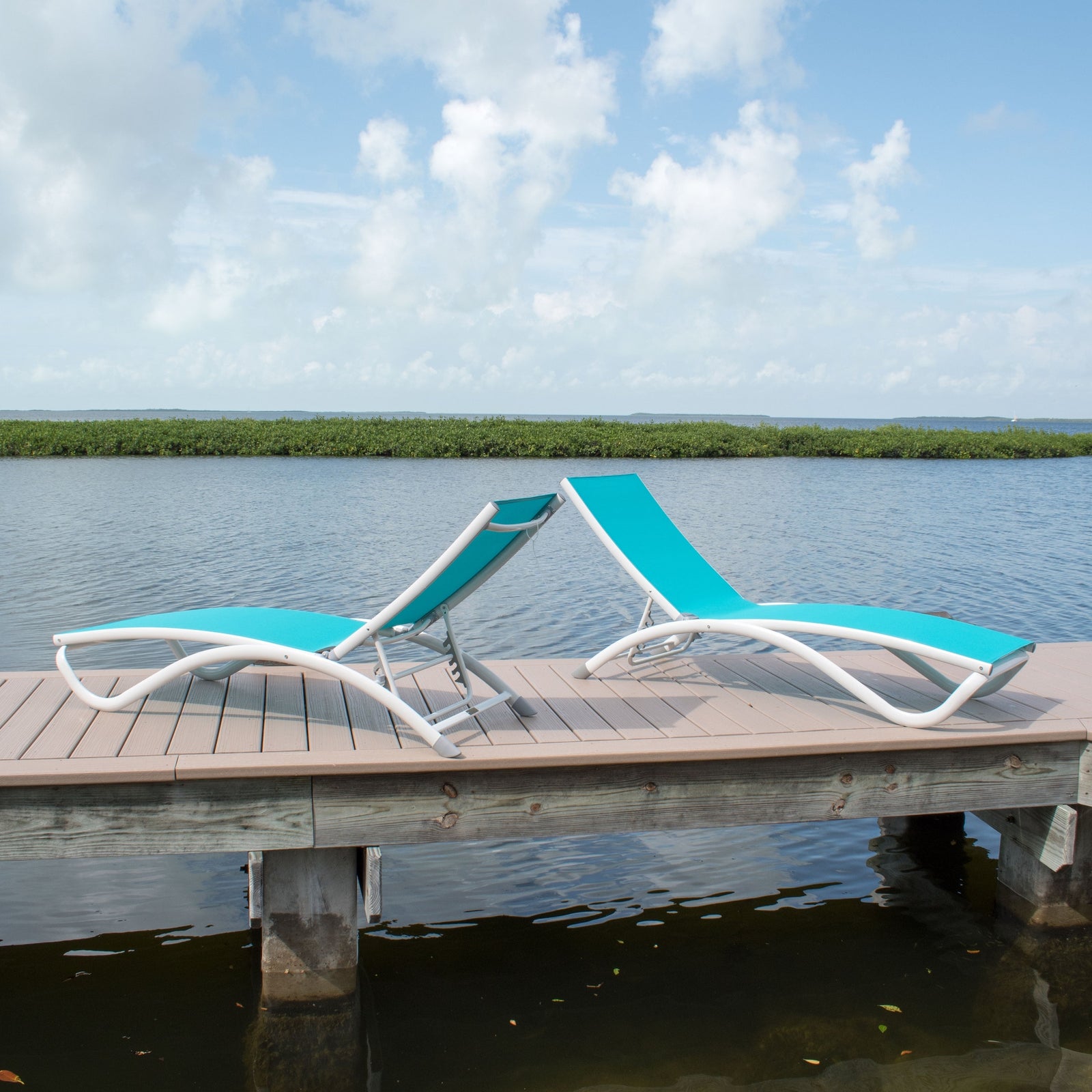 Hospitality Rattan Archway Set of 2 Stackable Teal Sling Chaise Lounge - set of 2 teal sling chaise lounges